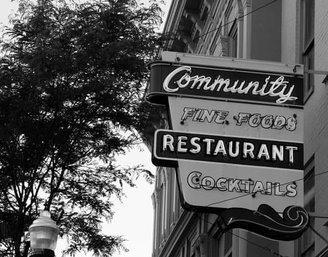 The Community Restaurant storefront sign on Main Street in downtown Cortland