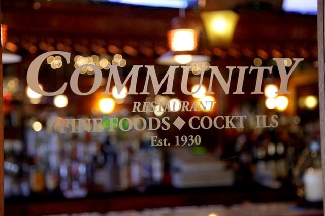 Team members behind the bar at the Community Restaurant